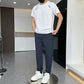 Set bestaande uit een ultradun, ademend sport-T-shirt van mesh en een lange broek
