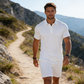 Tweedelige zomerset voor heren, bestaande uit een poloshirt en een korte broek